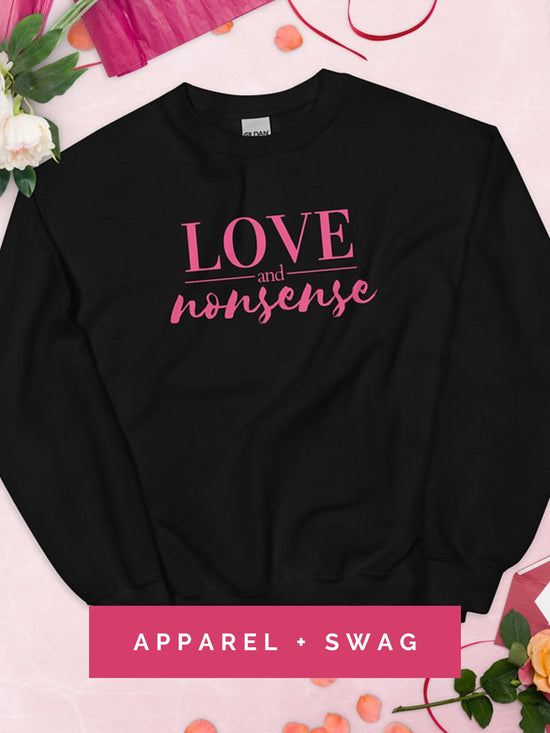 Image of black hoodie flatlay with text